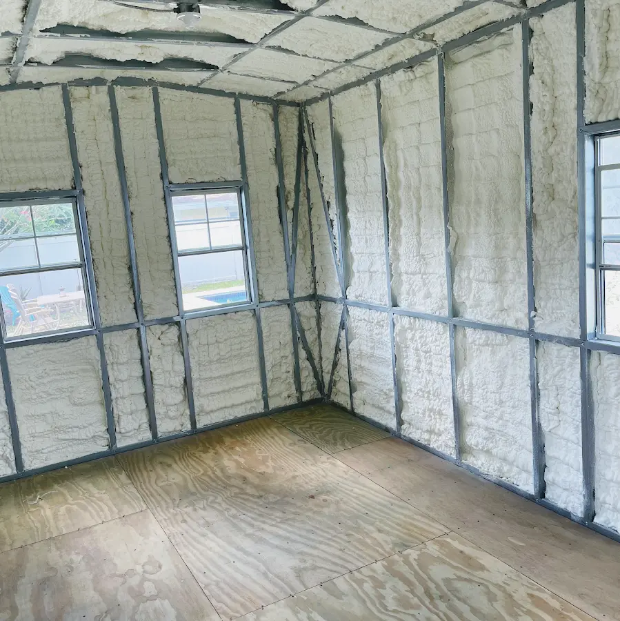 Closed-cell spray foam insulation applied to wall cavities in a residential project in Sheridan